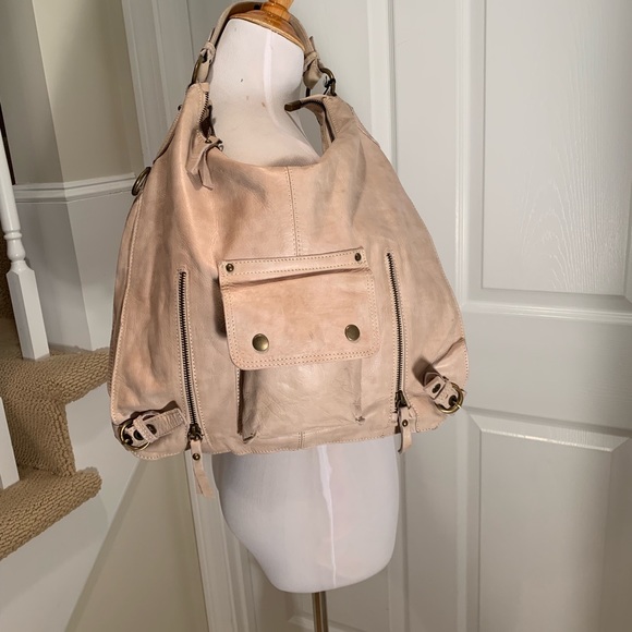 UiUiUee Handbags - NWT, soft leather bag. Light beige/dark cream